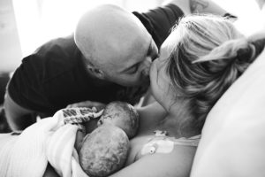 couple with new born twins photo Sarah Pulling of Bear Hunt Photography