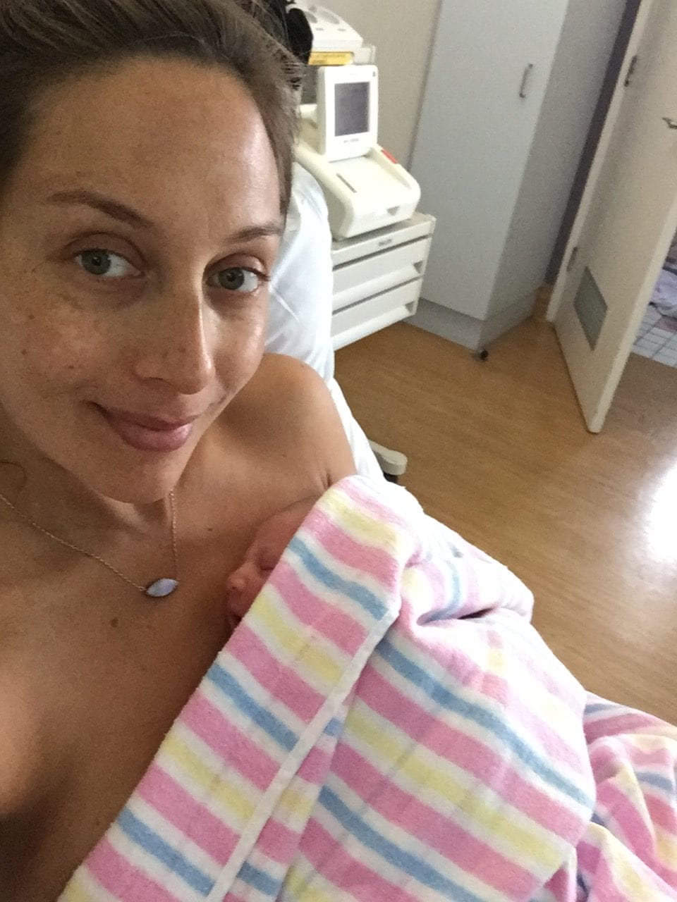 Alexi Willemsen holding her baby