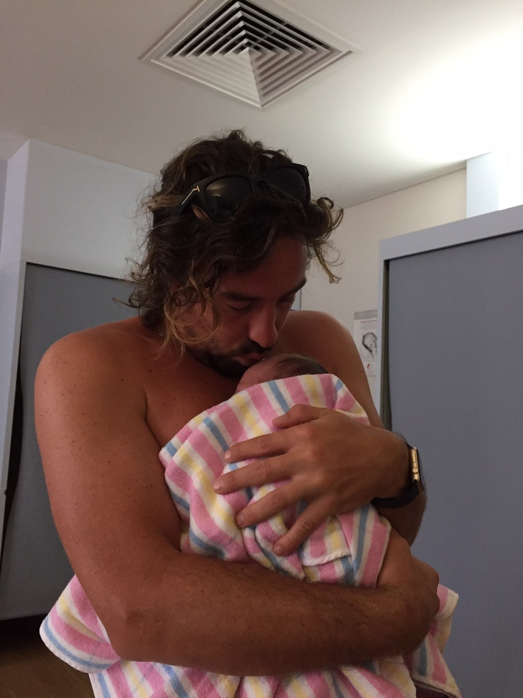 Alexi Willemsen partner holding baby